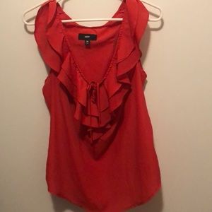Red tank top with ruffles.